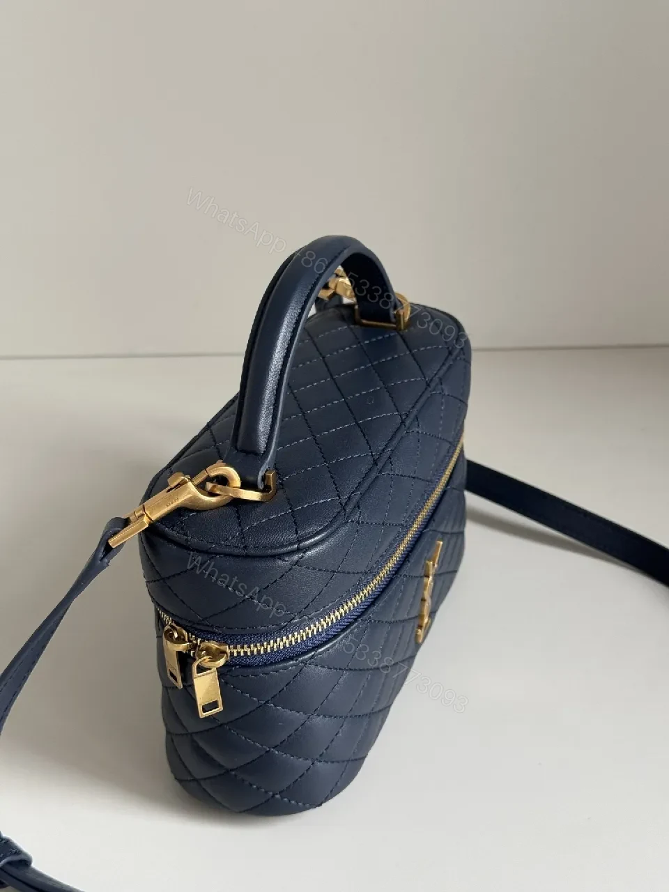 View 7 of Navy Quilted Leather Crossbody Bag with Gold Hardware