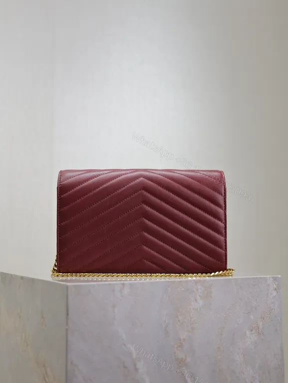 View 3 of Burgundy Quilted Envelope Crossbody Bag with Gold YSL Logo