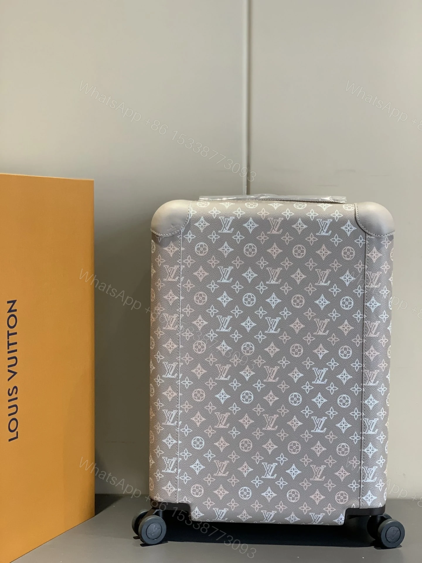 View 2 of Louis Vuitton Horizon 55 Suitcase Mahina Perforated Calfskin Leather Gray 55Cm M10282