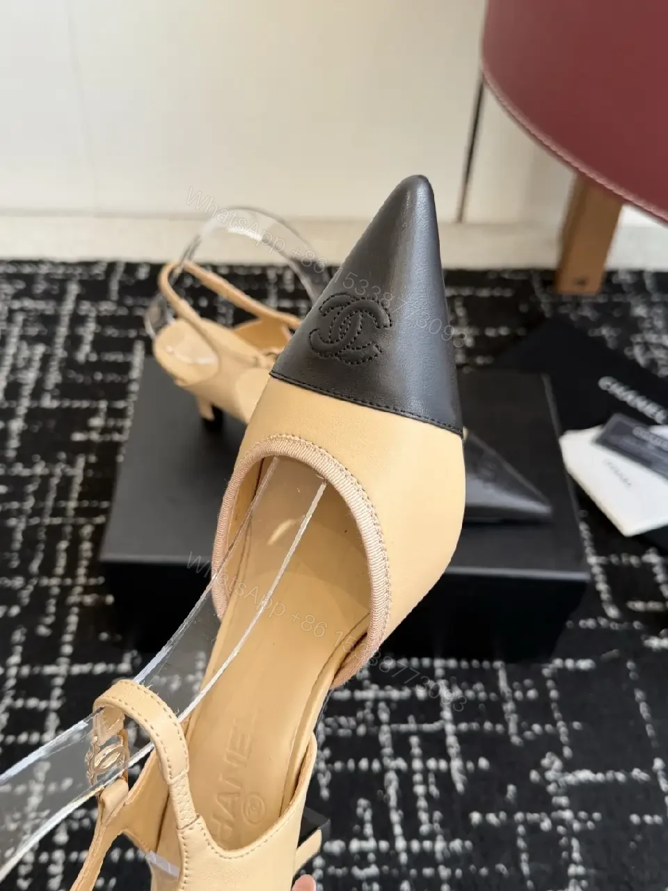 View 4 of Beige & Black Two-Tone Leather Slingback Pump with Chanel Logo
