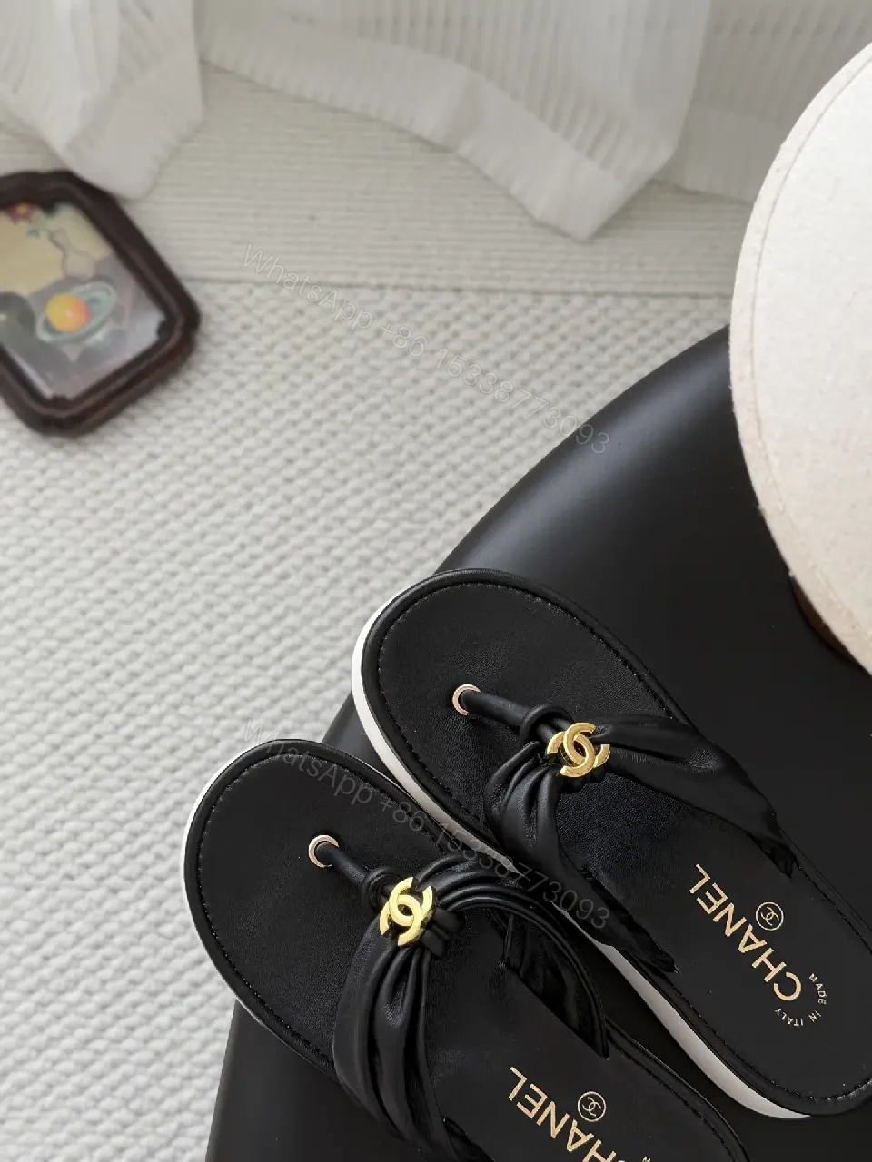 View 5 of Black Leather Slide Sandals with Gold Chanel Logo