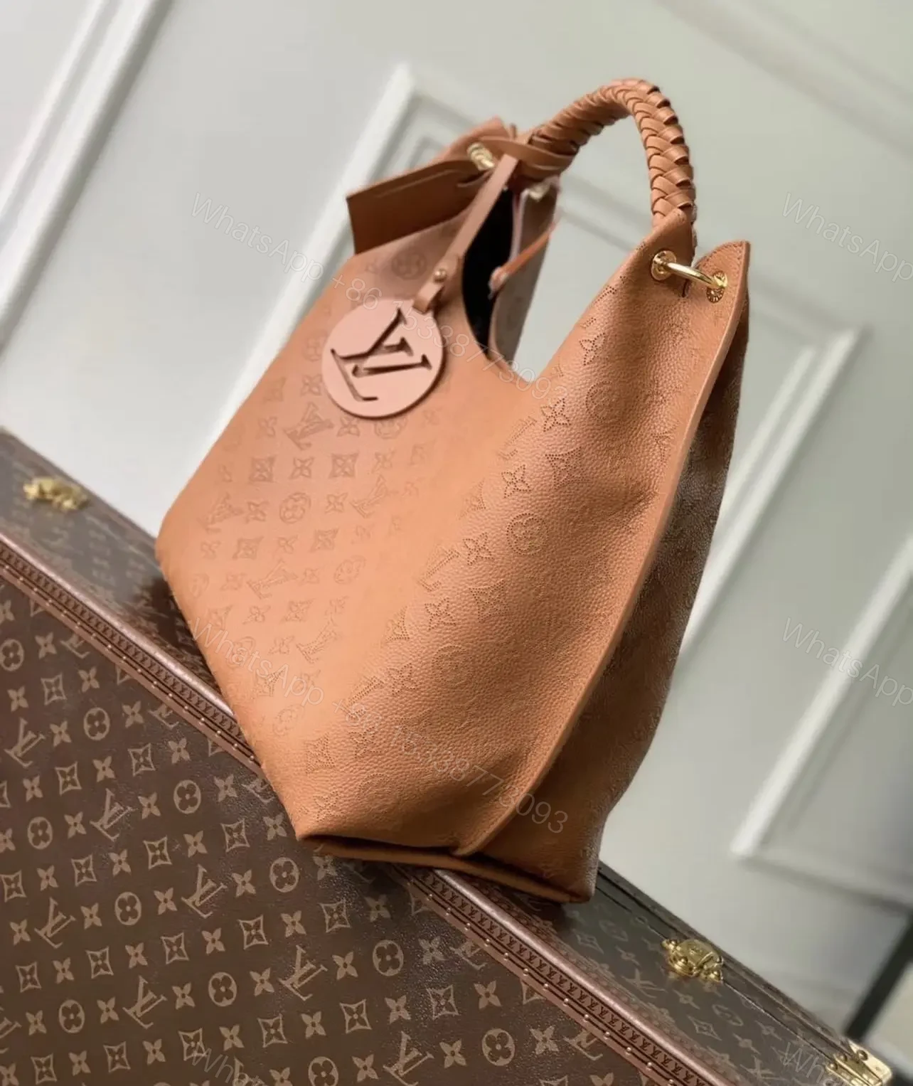 View 2 of Louis Vuitton Carmel Mahina Leather Hobo Bag in Cognac
