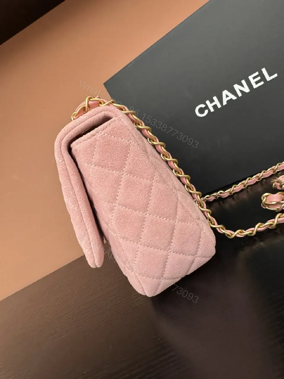 View 5 of Soft Pink Quilted Shoulder Bag with Gold Lock - Compact Luxury Bag