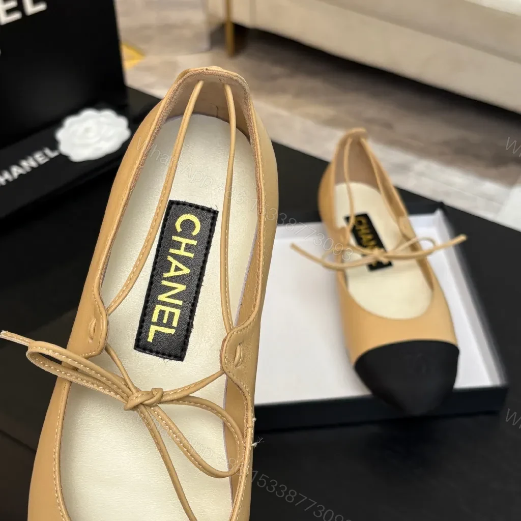 View 2 of Tan Leather Ballet Flats – Black-Tipped, Bow Accent, Cushioned Comfort
