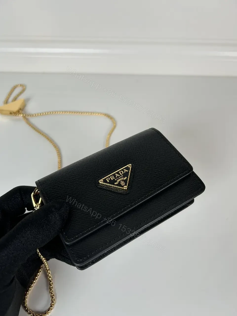 View 6 of Compact Crossbody Bag: Black Leather, Gold Chain, Minimalist Luxe
