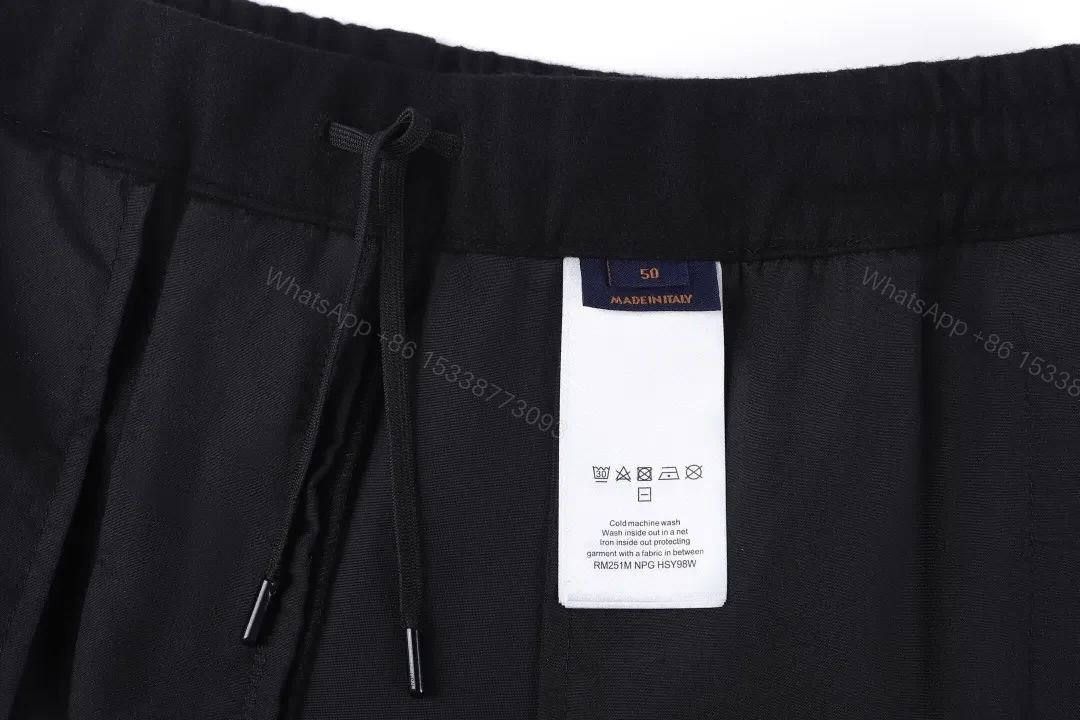 View 4 of Chic Black Wide-Leg Track Pants with Subtle Monogram Monstère