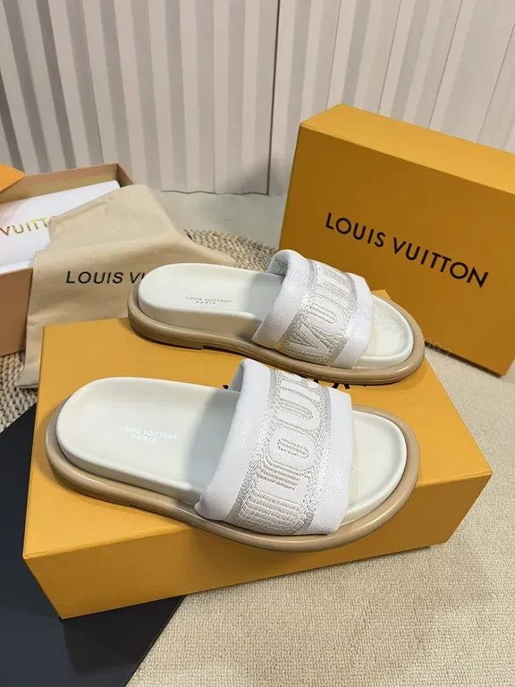 View 8 of Louis Vuitton Luxe Textured Slides with Logo Embellishment