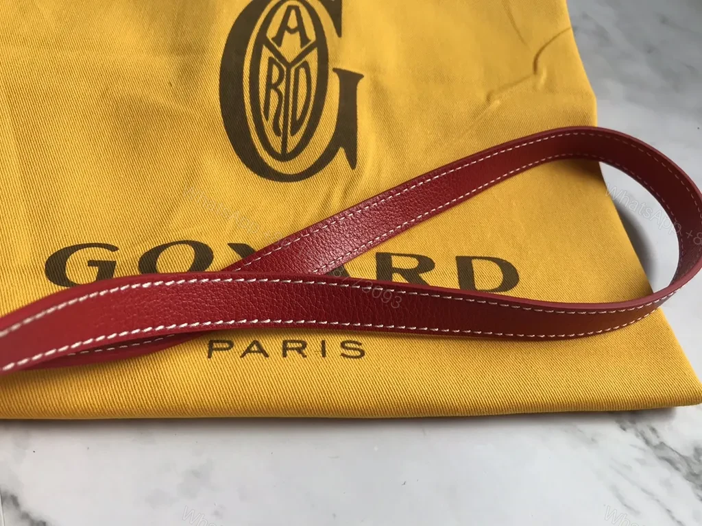 View 7 of Bold Goyardine Bucket Bag in Red Leather Trim