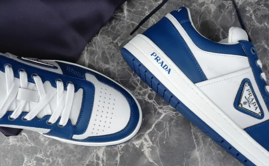 View 10 of PRADA DOWNTOWN LEATHER SNEAKERS IN WHITE AND LACQUER BLUE- PRD011