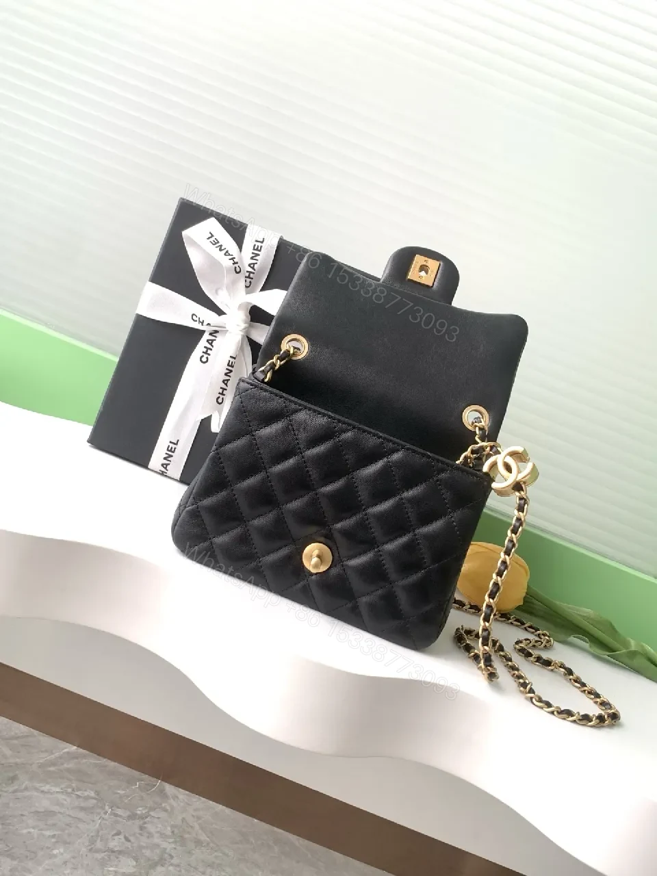 View 5 of Black Quilted Calfskin Bag - Modern Flap, Gold Chain, Luxe Essential