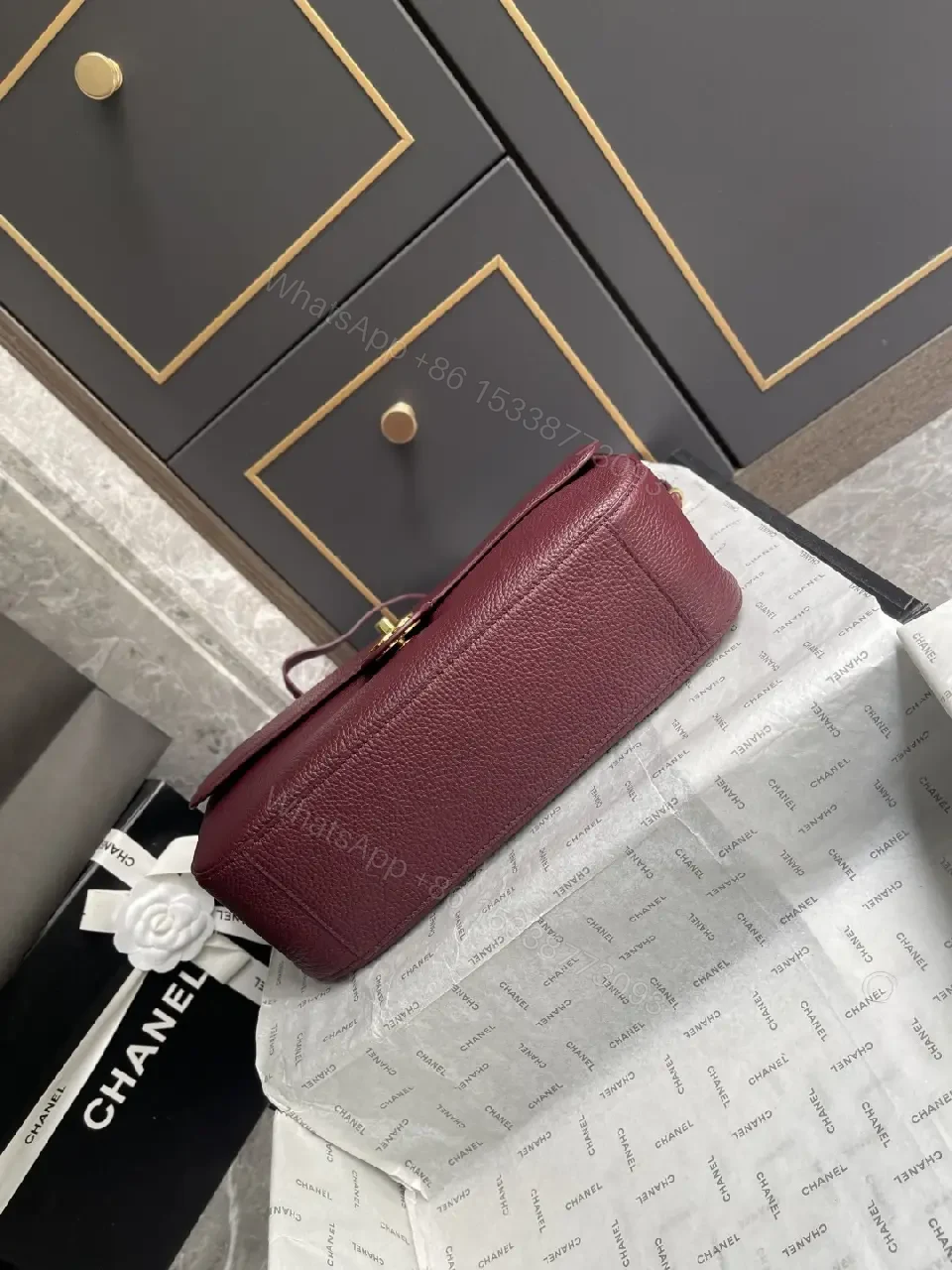 View 5 of Burgundy Textured Leather Shoulder Bag: Compact Luxury