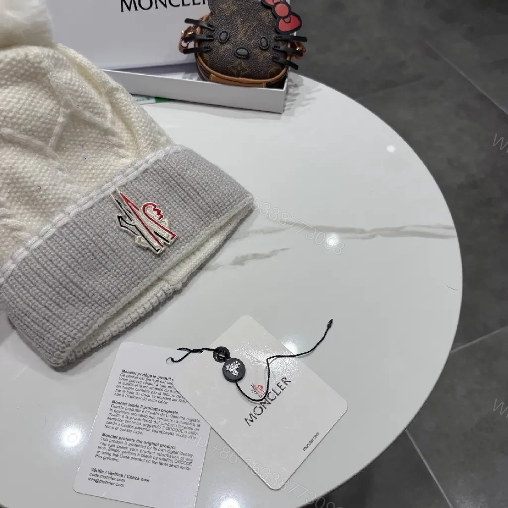 View 7 of Chic Winter Knit Beanie with Plush Pom and Moncler Accent