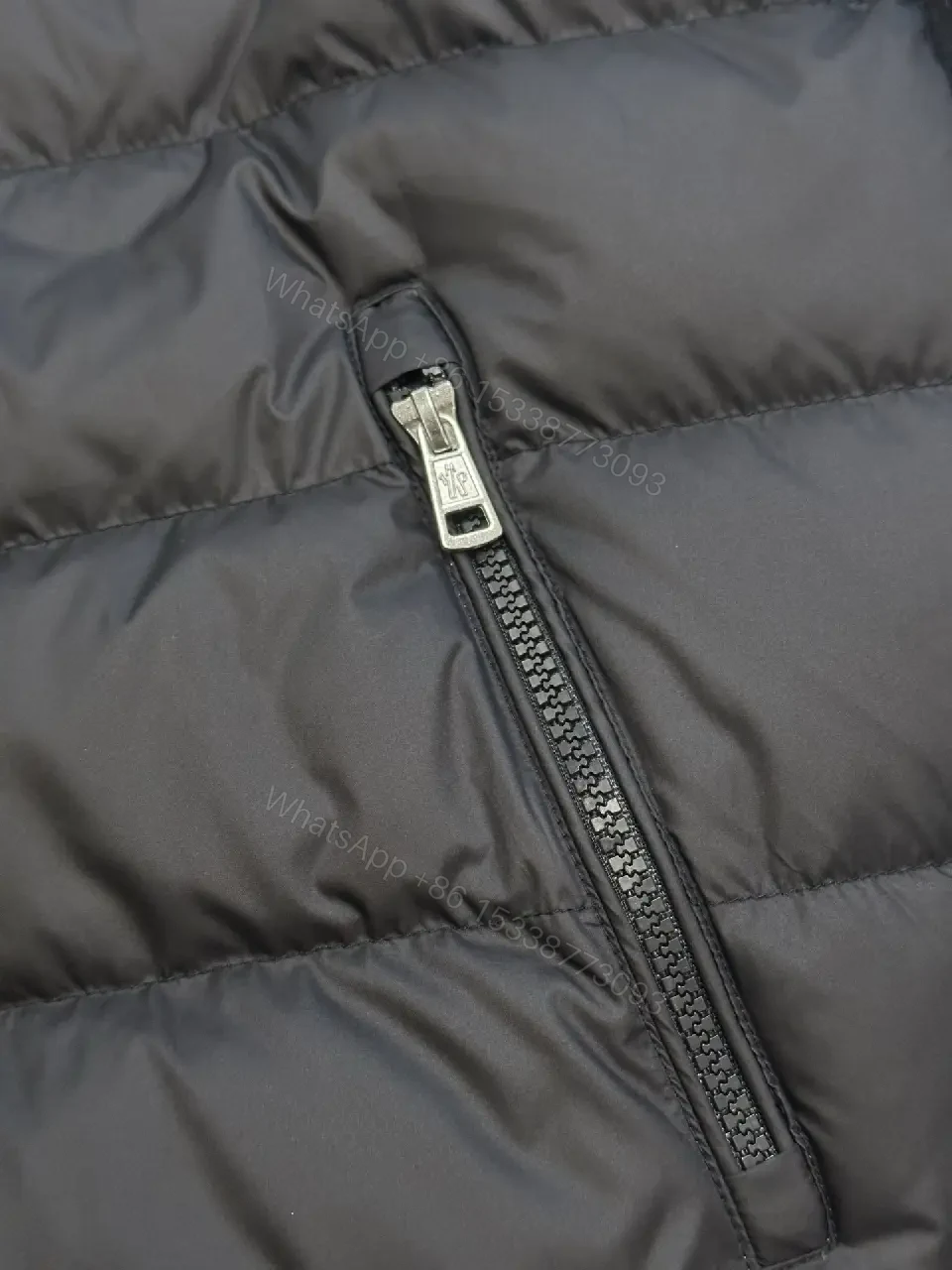 View 9 of Tech-Inspired Quilted Jacket with Knit Sleeves - Versatile Outerwear