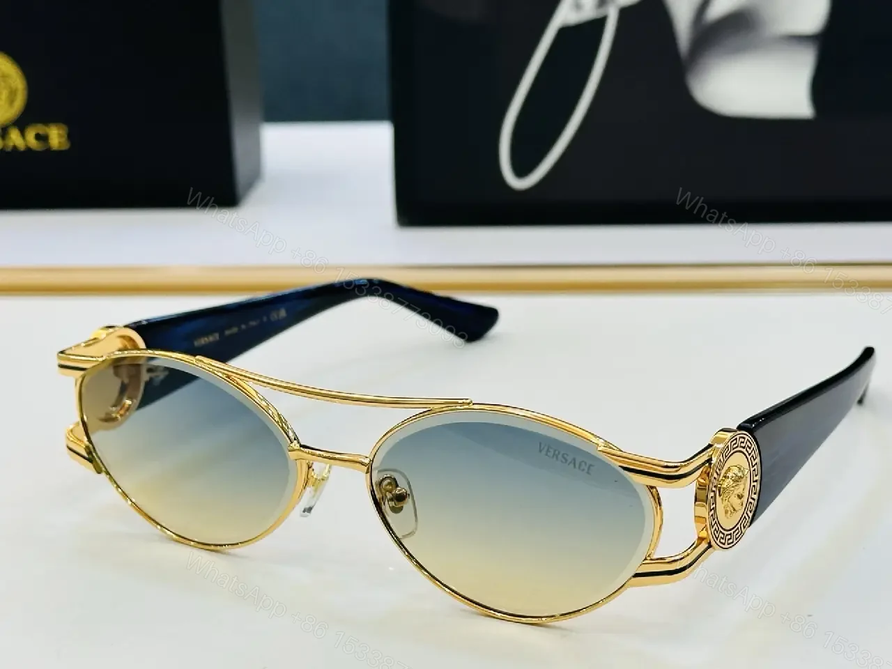 View 2 of Gold-Tone Frame Sunglasses: Luxe Comfort, Bold Attitude