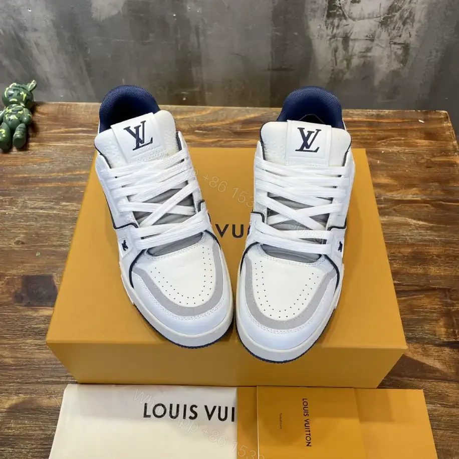 View 8 of LOUIS VUITTON LV TRAINER SNEAKERS IN WHITE AND NAVY BLUE – LSVT353