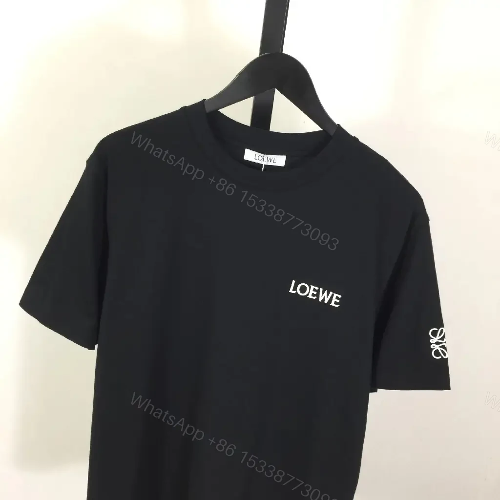 View 5 of Minimalist Black Tee: Subtle Branding, Everyday Luxury Tee