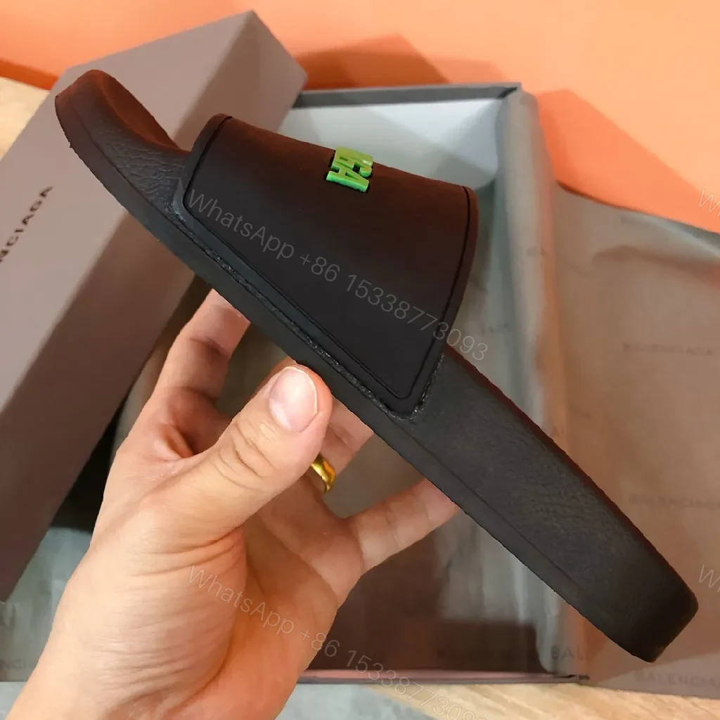 View 9 of Bold Neon Logo Slides: Black Comfort, Statement Style