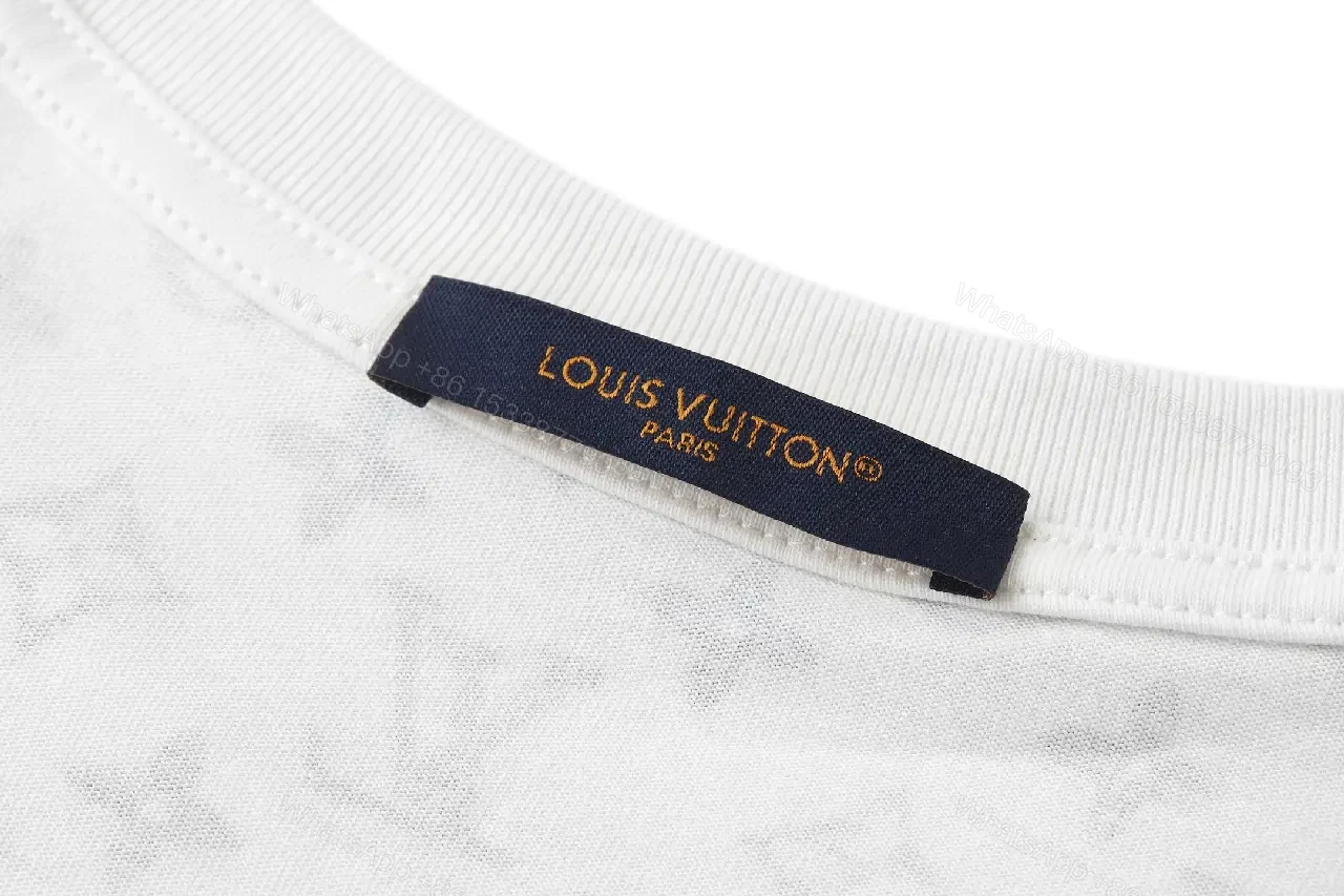 View 10 of White Cotton Graphic Tee: Gradient LV Monogram Pattern Top