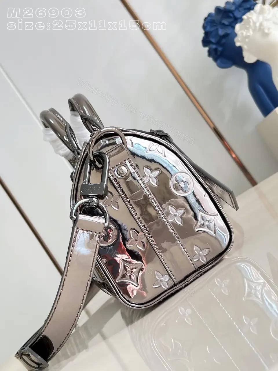 View 3 of Compact Metallic Satchel: Monogram-Texture Carryall