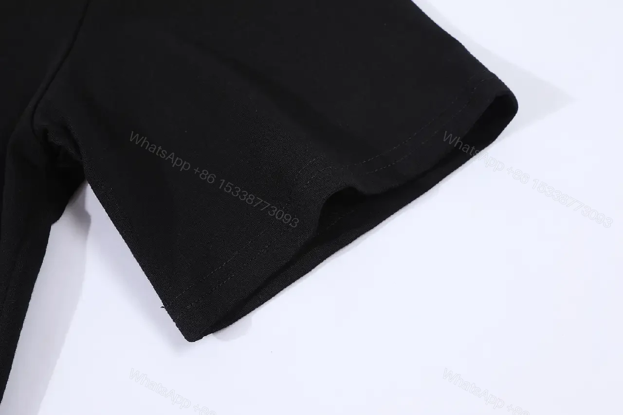 View 9 of Black Cotton Minimalist Tee – Subtle Chest Logo, Premium Essential