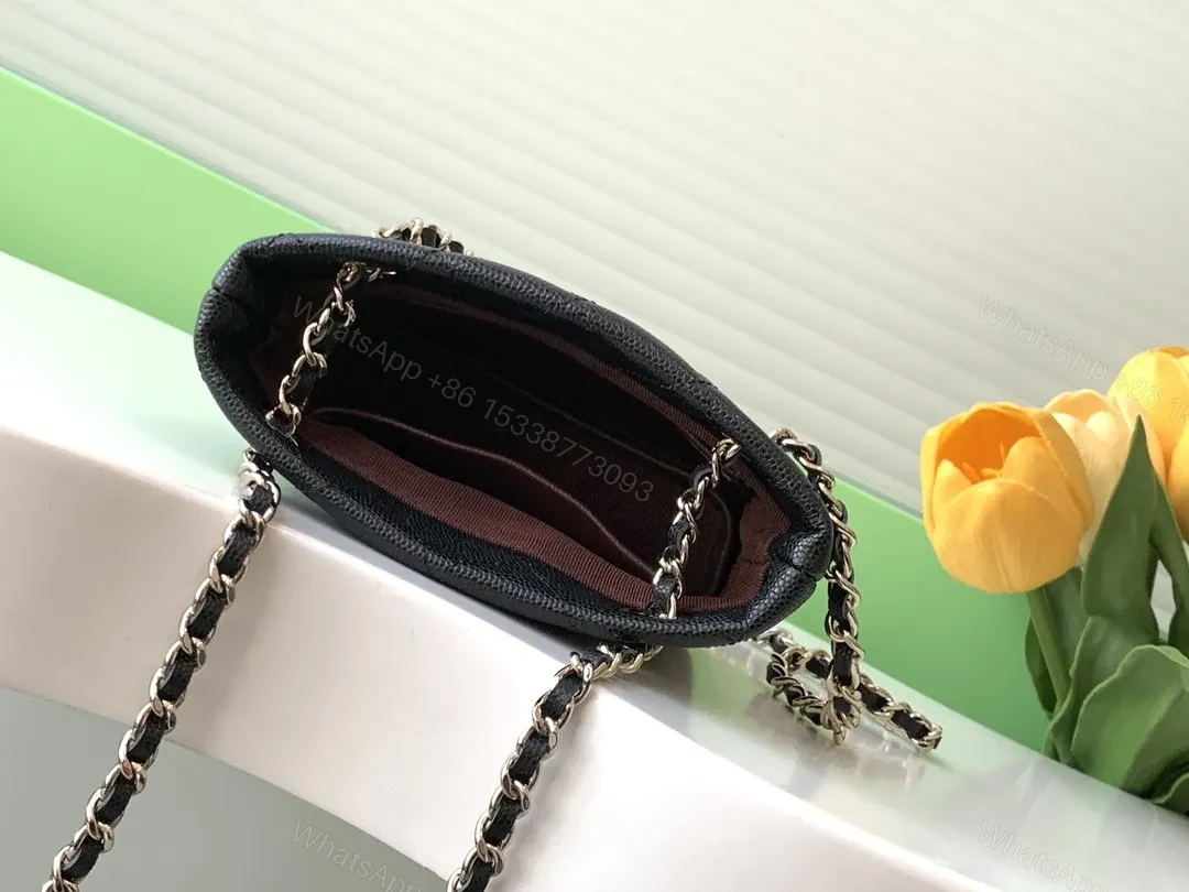 View 9 of Small-Structured Quilted Bag with Iconic Chain Strap