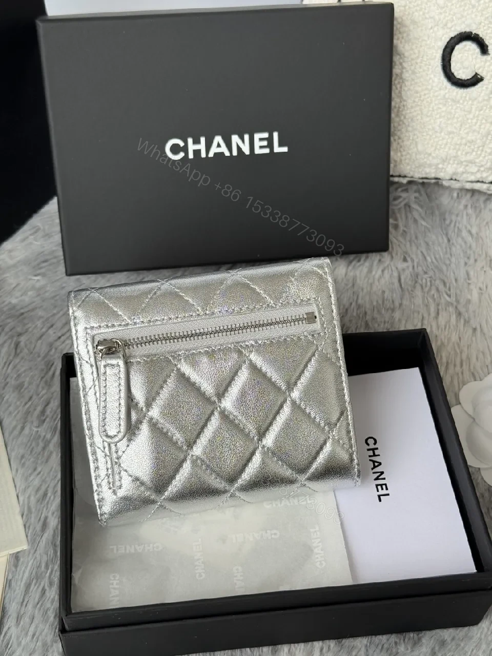 View 10 of Compact Silver Quilted Wallet with Signature Hardware