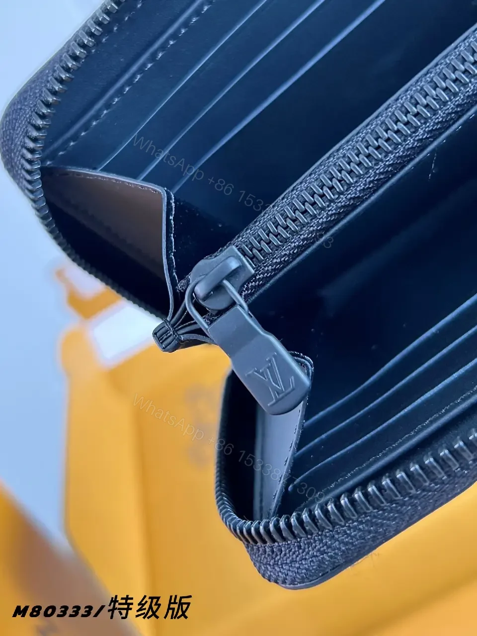 View 4 of Navy Leather Zip Continental Wallet with LV Embossed Monogram