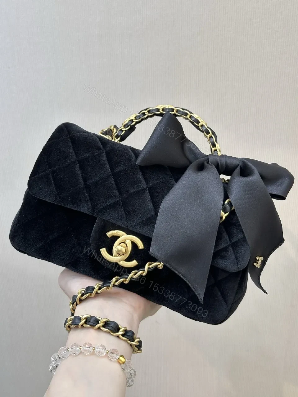 Quilted Velvet Handbag with Satin Bow Accent and Gold Chain — view 1