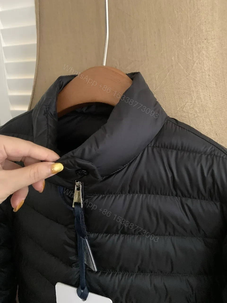 View 3 of Black Nylon Puffer Jacket: Sleek, Insulated Warmth with Patch