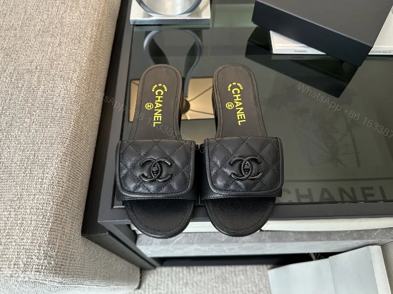 View 6 of Chic Black Quilted Slides with Logo Detailing