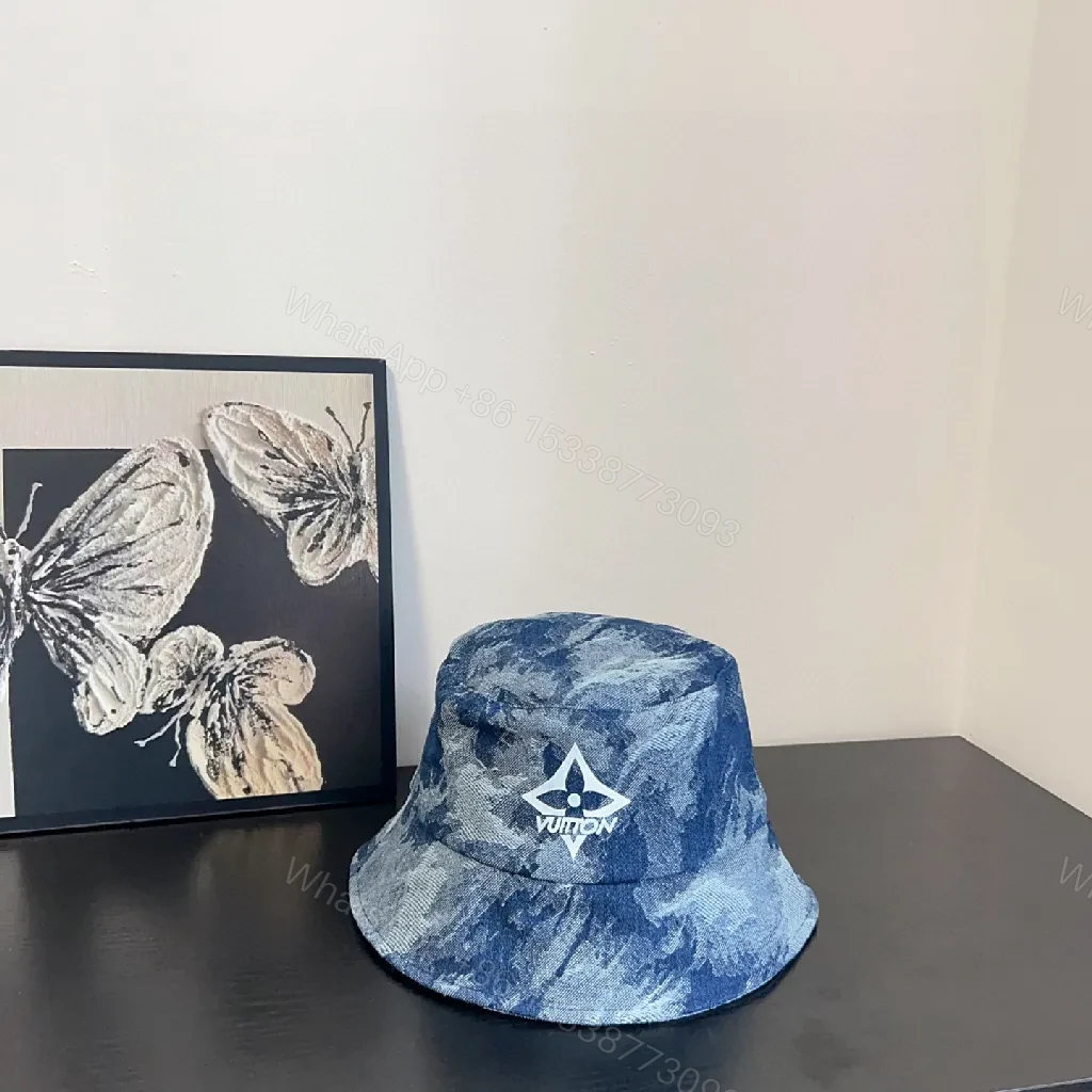 Textured Denim Bucket Hat: Luxe, Designer-Inspired Emblem — view 1