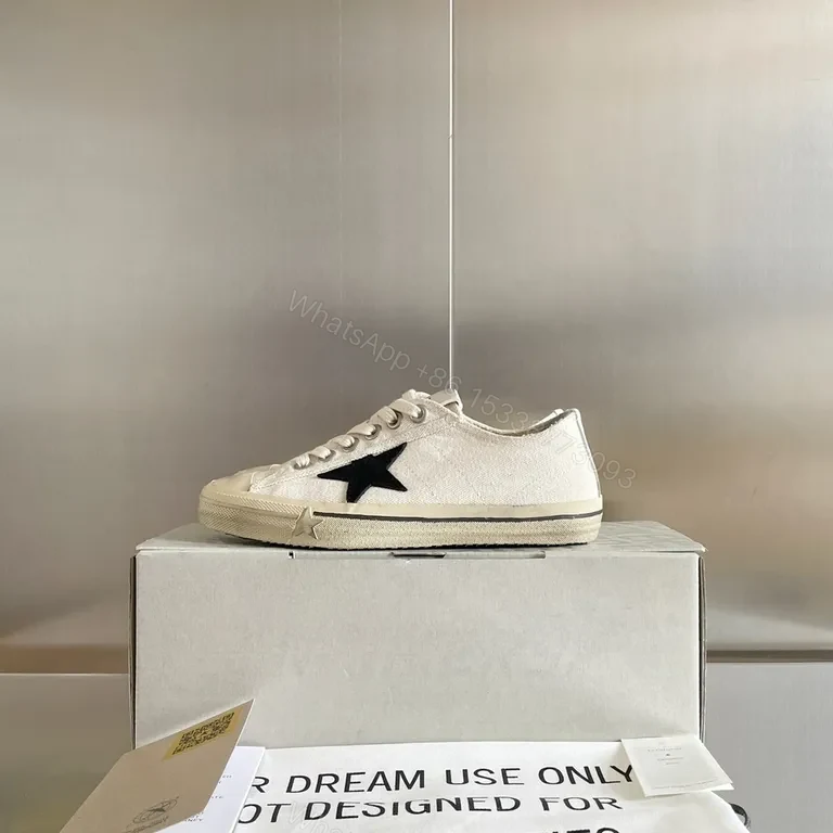 View 5 of Chic Canvas Star Sneakers - Signature Detail, Unisex