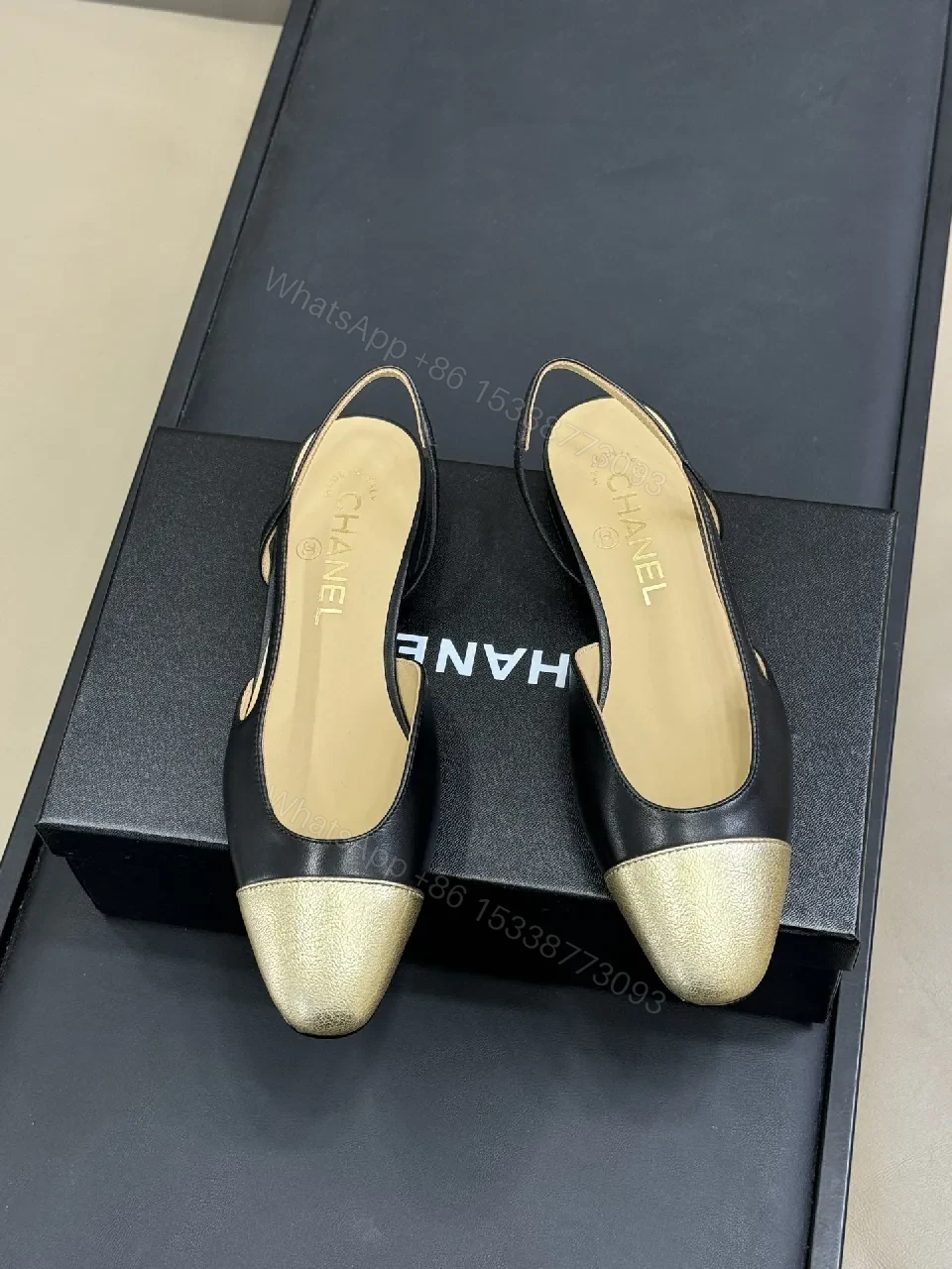 View 2 of Elegant Slingback Pumps: Black Leather with Metallic Cap Toe
