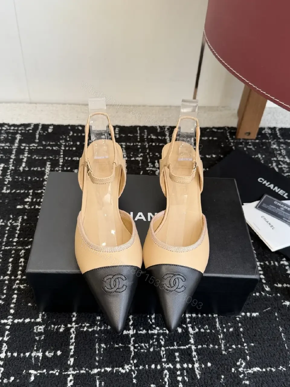 View 5 of Beige & Black Two-Tone Leather Slingback Pump with Chanel Logo