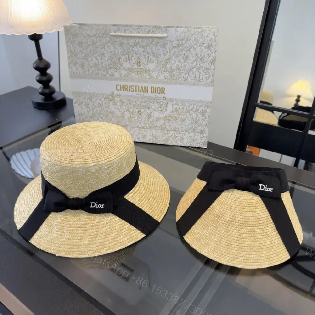View 7 of Natural Straw Wide-Brim Hat with Black Ribbon Accent