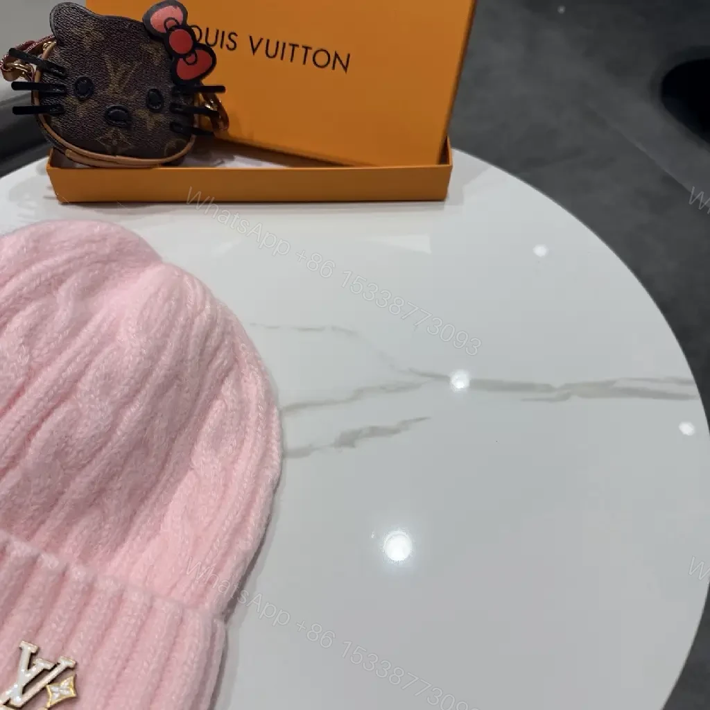 View 6 of Pastel Knit Beanie with Silver Emblem – Luxe Everyday Accessory