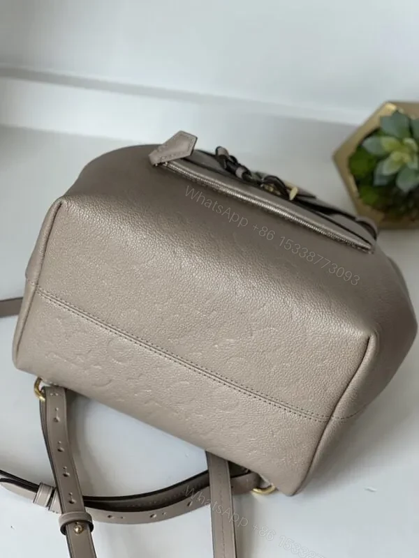 View 8 of LOUIS VUITTON Monogram Empreinte Montsouris PM Backpack Replica