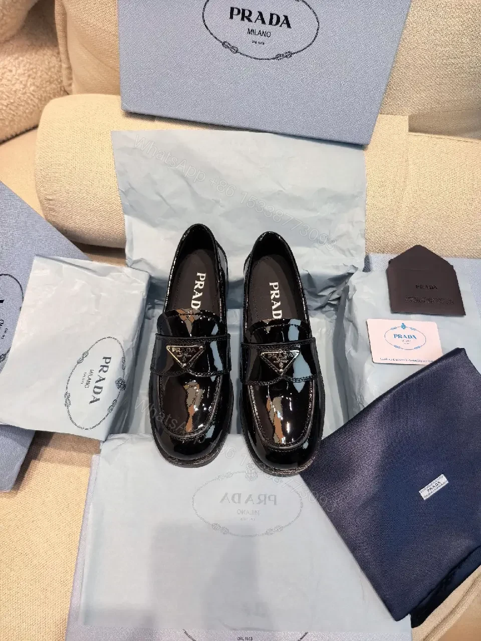 View 7 of Black Patent Leather Loafers Prada Style Feature: Logo Detail Shoe Type: Loafers