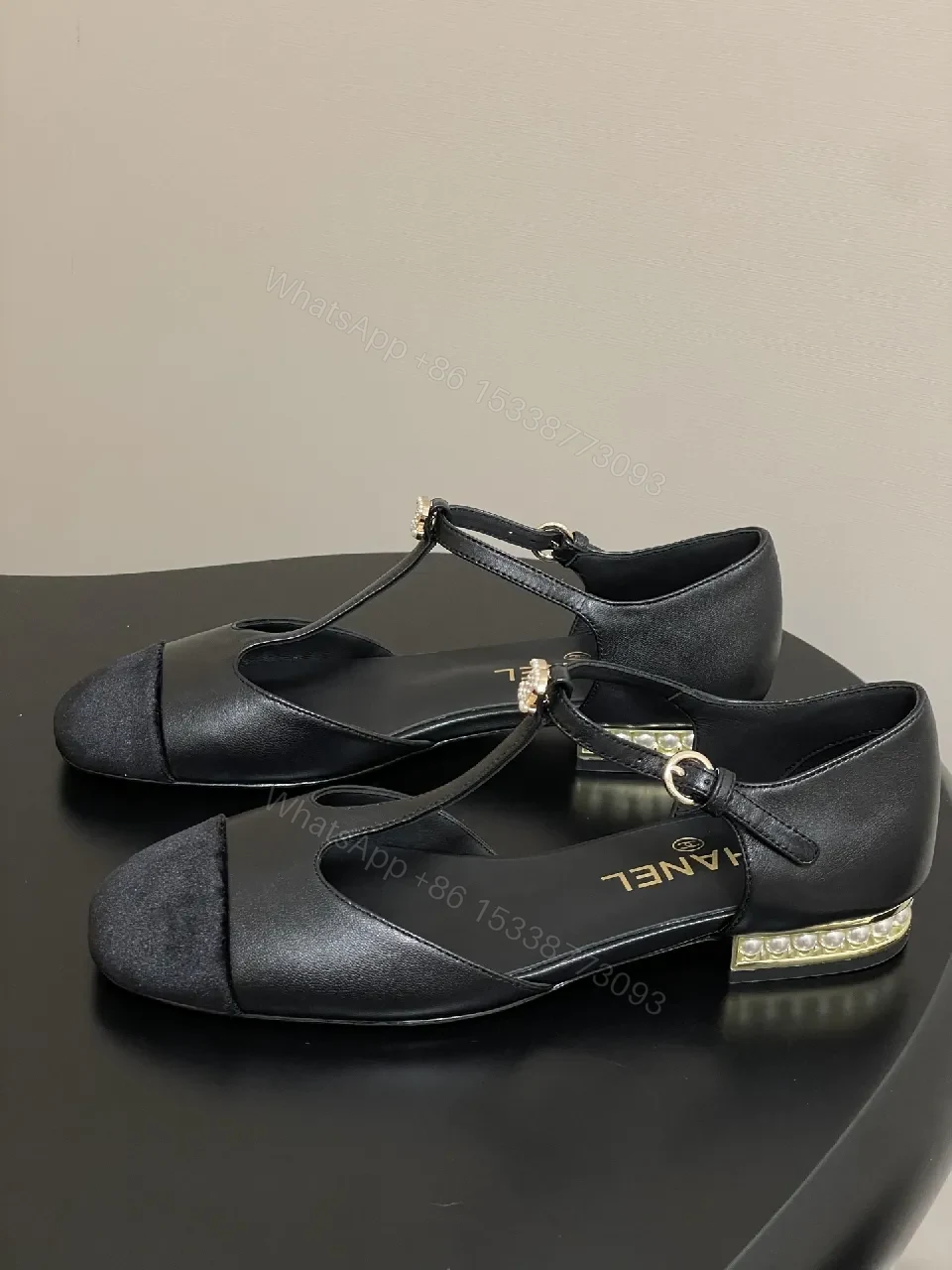 View 9 of Chic Black Suede T-Strap Pumps with Pearl Clasp