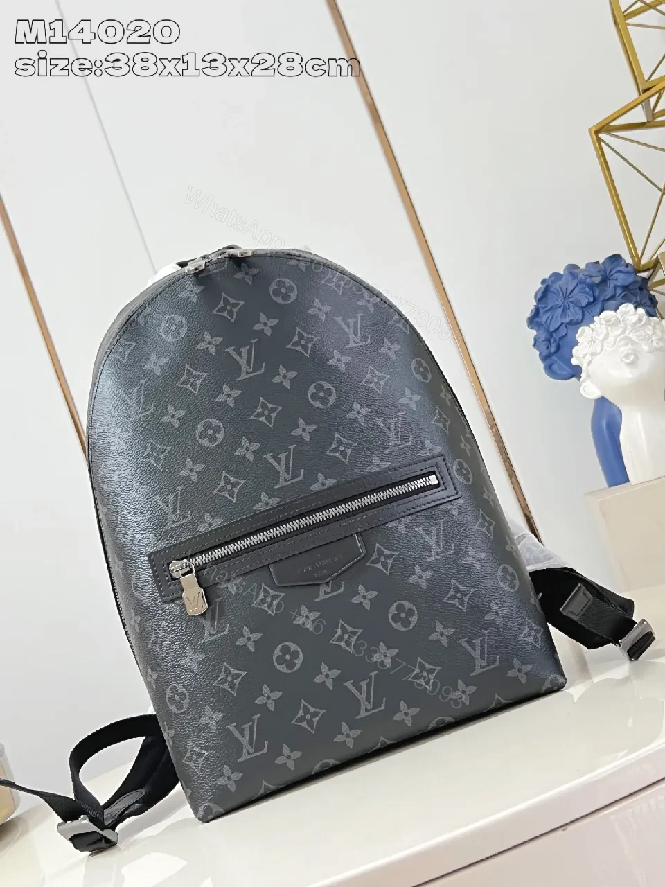 Compact Monogram Canvas Backpack: Subtle Luxury, Everyday Utility — view 1