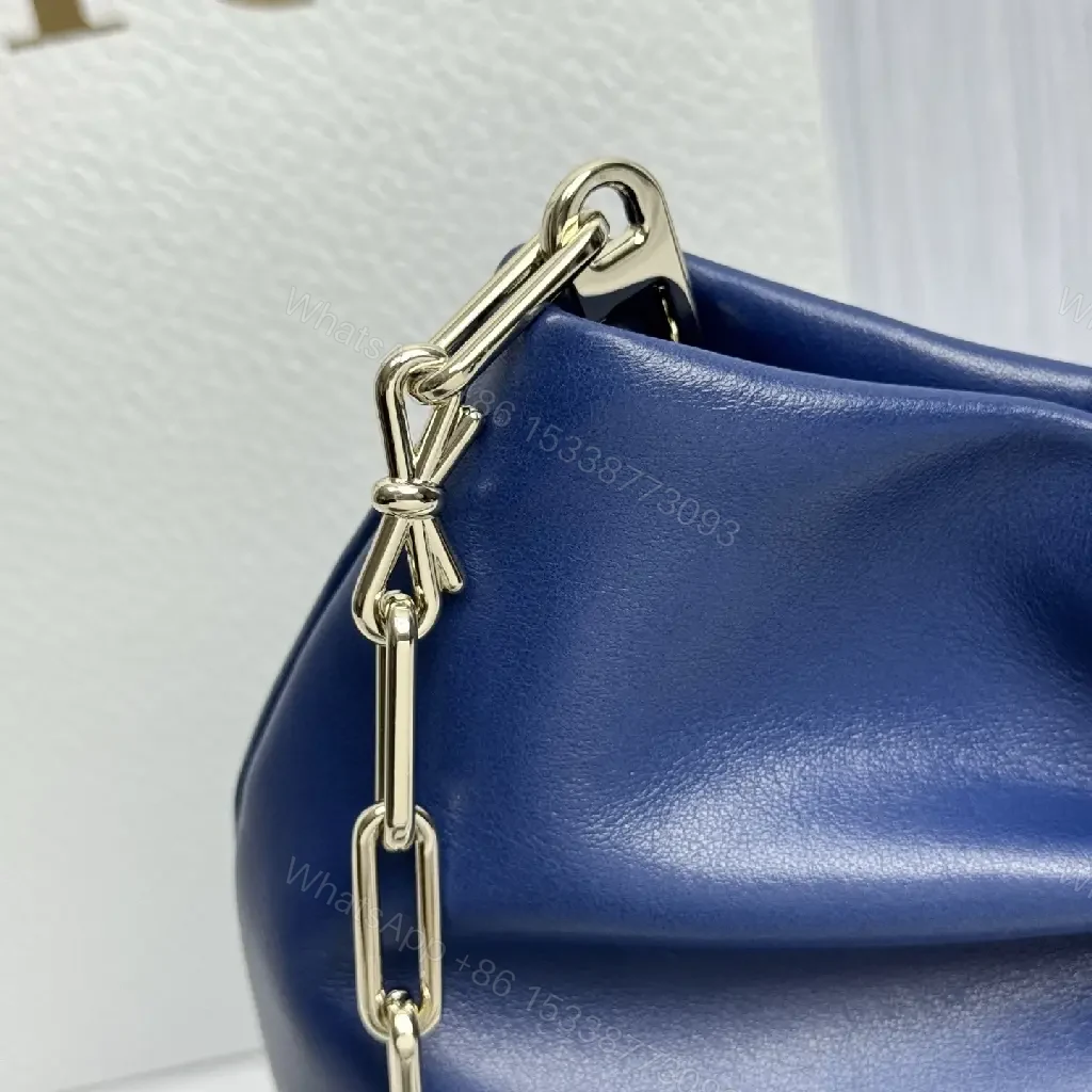 View 5 of Elegant Navy Textured Bag with Bowed Chain - Luxury Everyday Tote