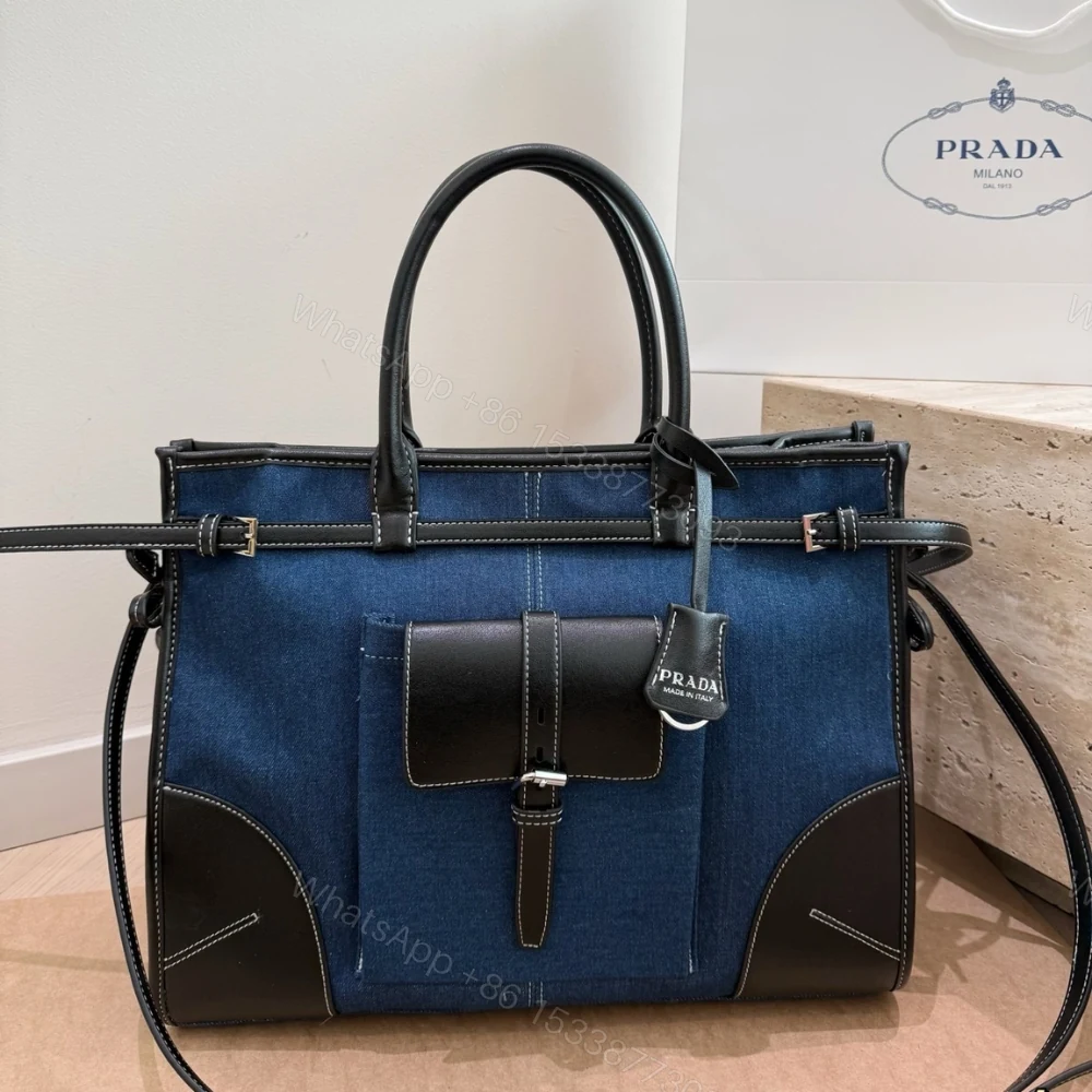 View 2 of Prada Bonnie Denim and Brown Leather Tote Bag with Buckle Detail 38cm