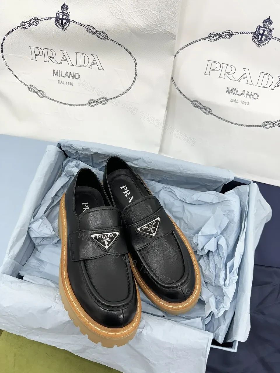 View 6 of Black Leather Loafers: Luxe Signature Crest, Rugged Comfort