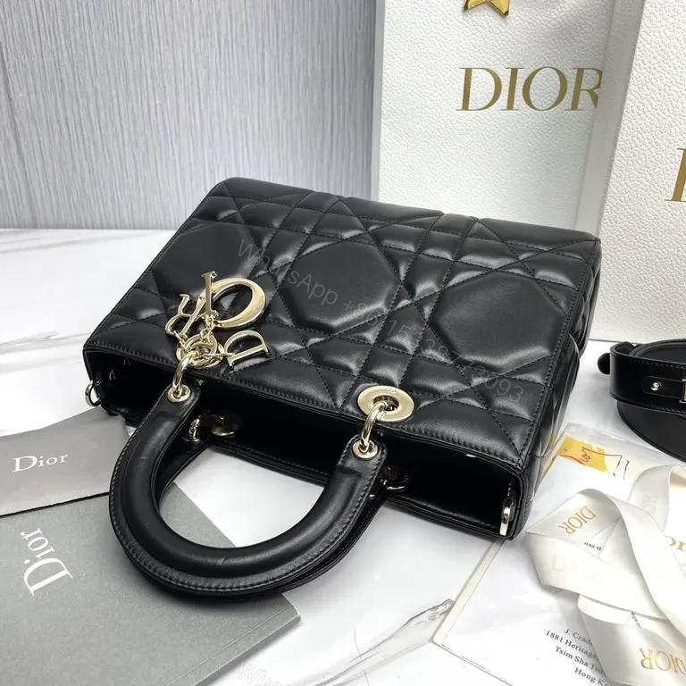 View 8 of Chic Black Quilted Mini Bag with Gold Dior Charms, All-Day Luxury