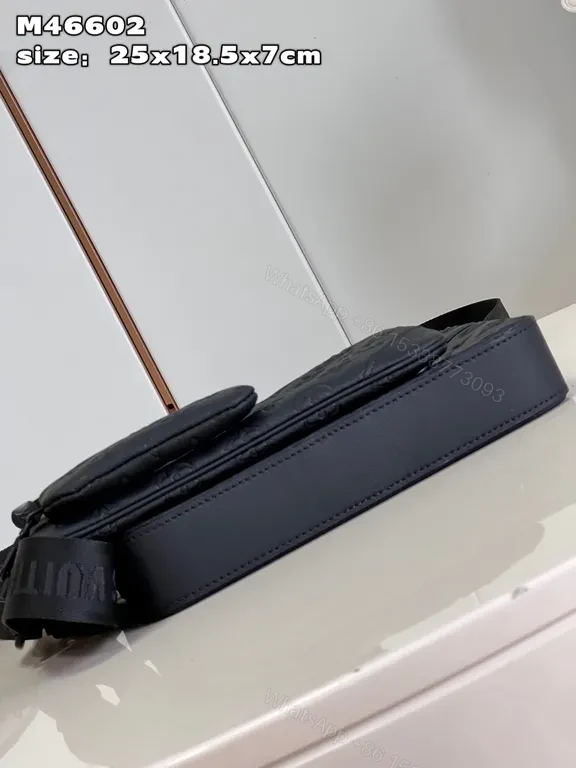 View 2 of Navy Calfskin Monogram Crossbody: Compact Luxury Carry