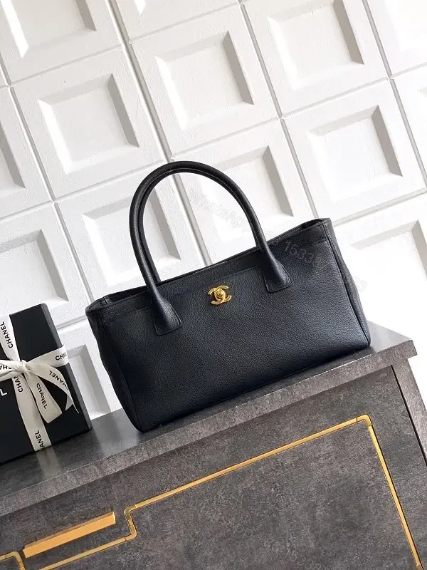 Structured Black Leather Tote with Gold Closure Tote — view 1