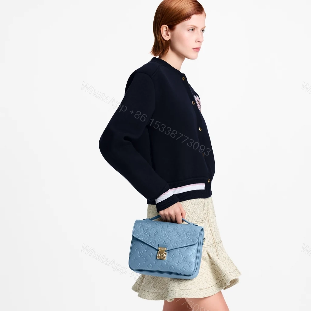 View 10 of Louis Vuitton Pochette Métis Monogram Empreinte Bleu Jean 25cm M27357