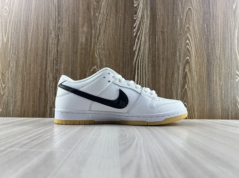 View 5 of Minimal White & Black Nike-Style Sneaker with Gum Sole