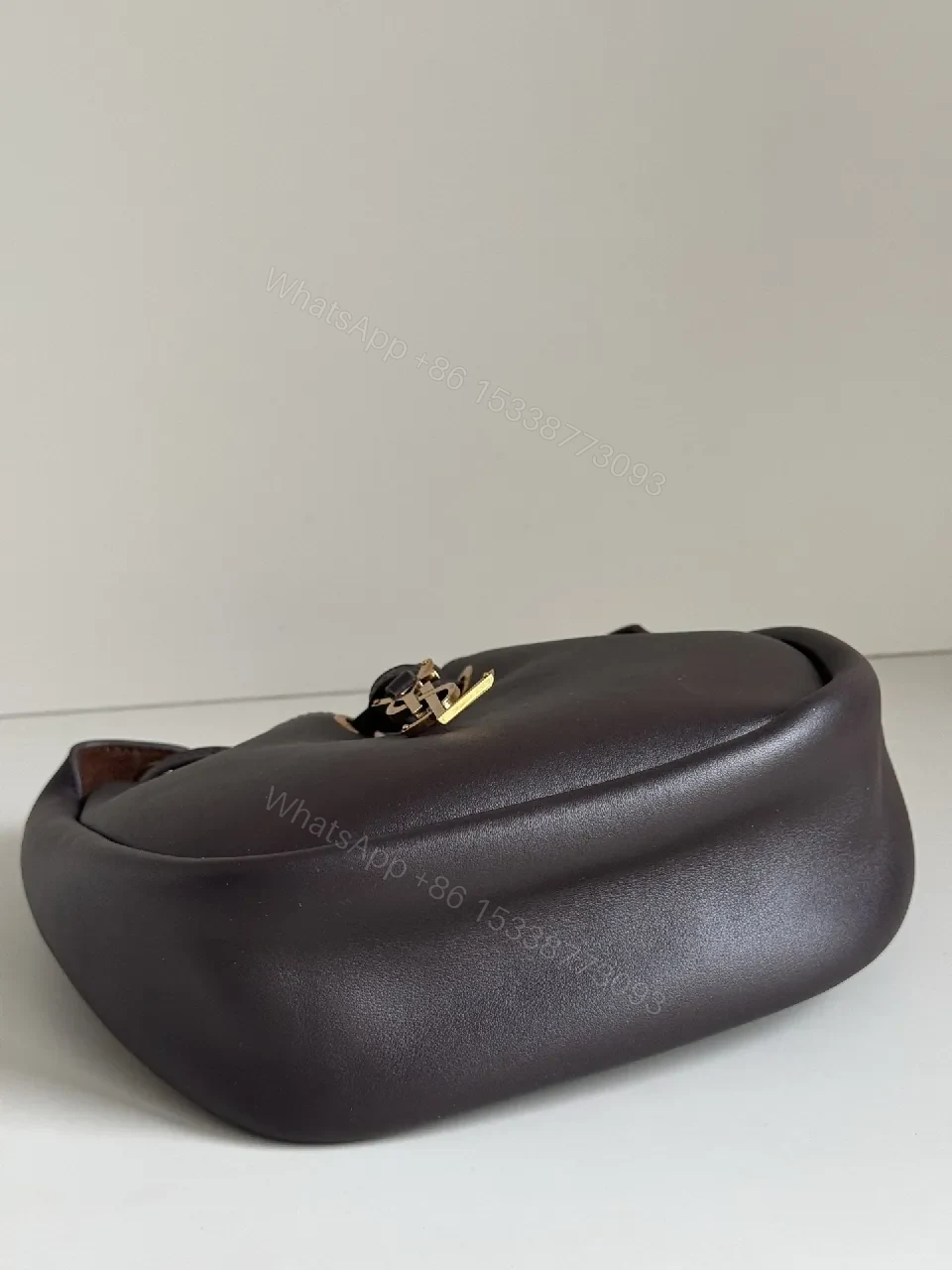 View 2 of Deep Black + Leather + Minimalist + Gold Hardware + Bucket Bag