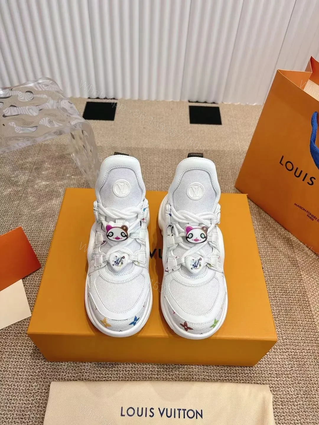 View 3 of LV Women White Mesh Multicolor Logo Sneakers